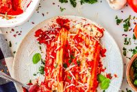 Creamy Three-Cheese Manicotti with Homemade Tomato Sauce