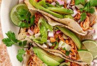 Slow-Cooker Chicken Tinga Tacos with Tangy Chipotle Sauce