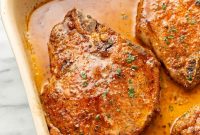 Juicy Oven-Baked Pork Chops with Garlic and Herbs