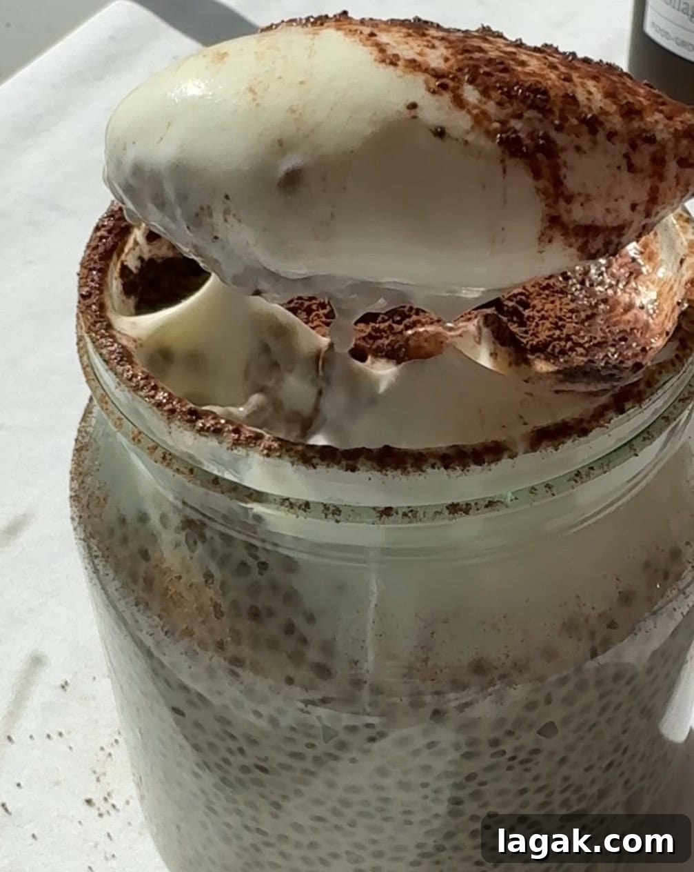 Tiramisu Chia Pudding with Creamy Yogurt — Quick Recipe 3 spooning the chia pudding.