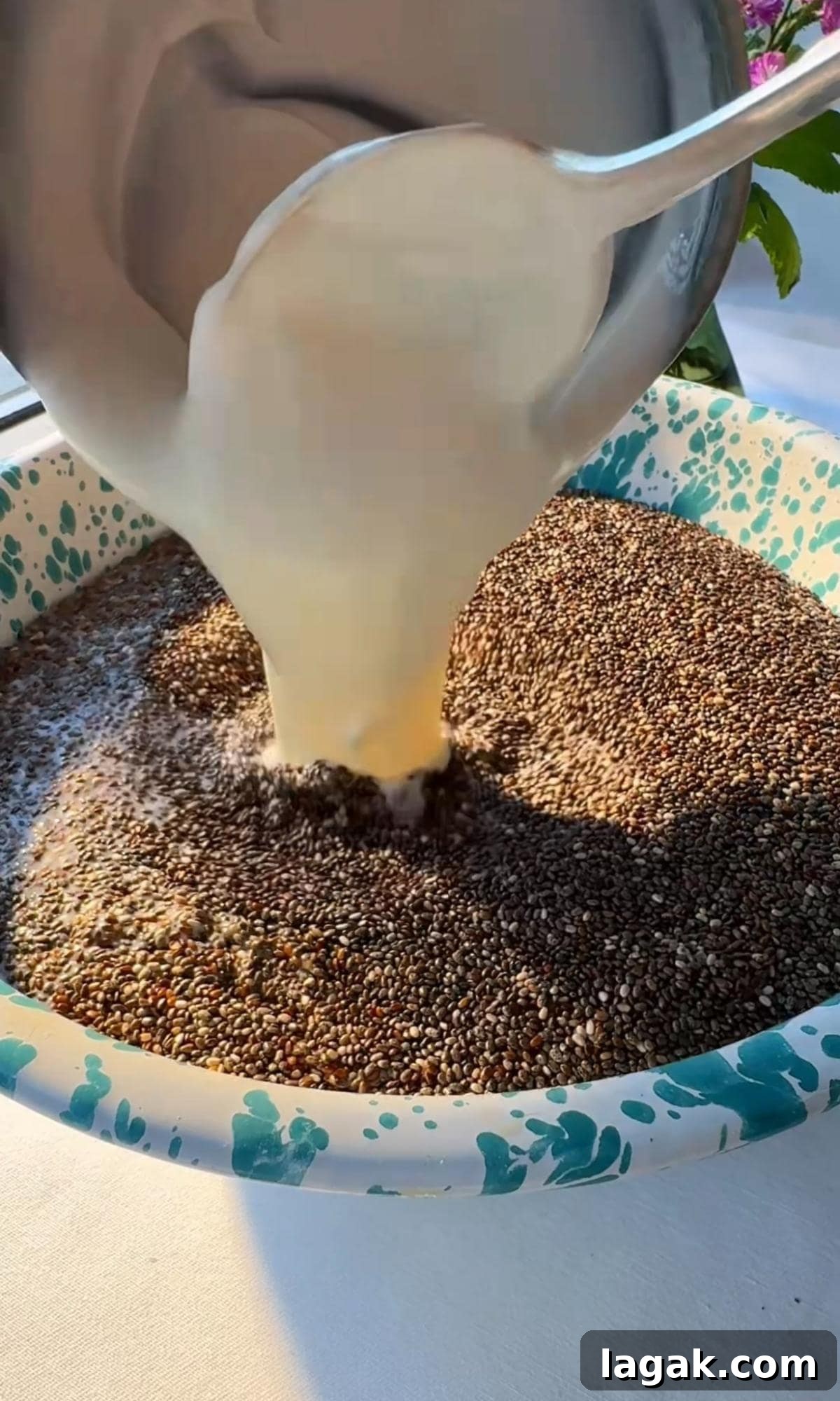 Tiramisu Chia Pudding with Creamy Yogurt — Quick Recipe 5 adding yogurt to chia pudding.