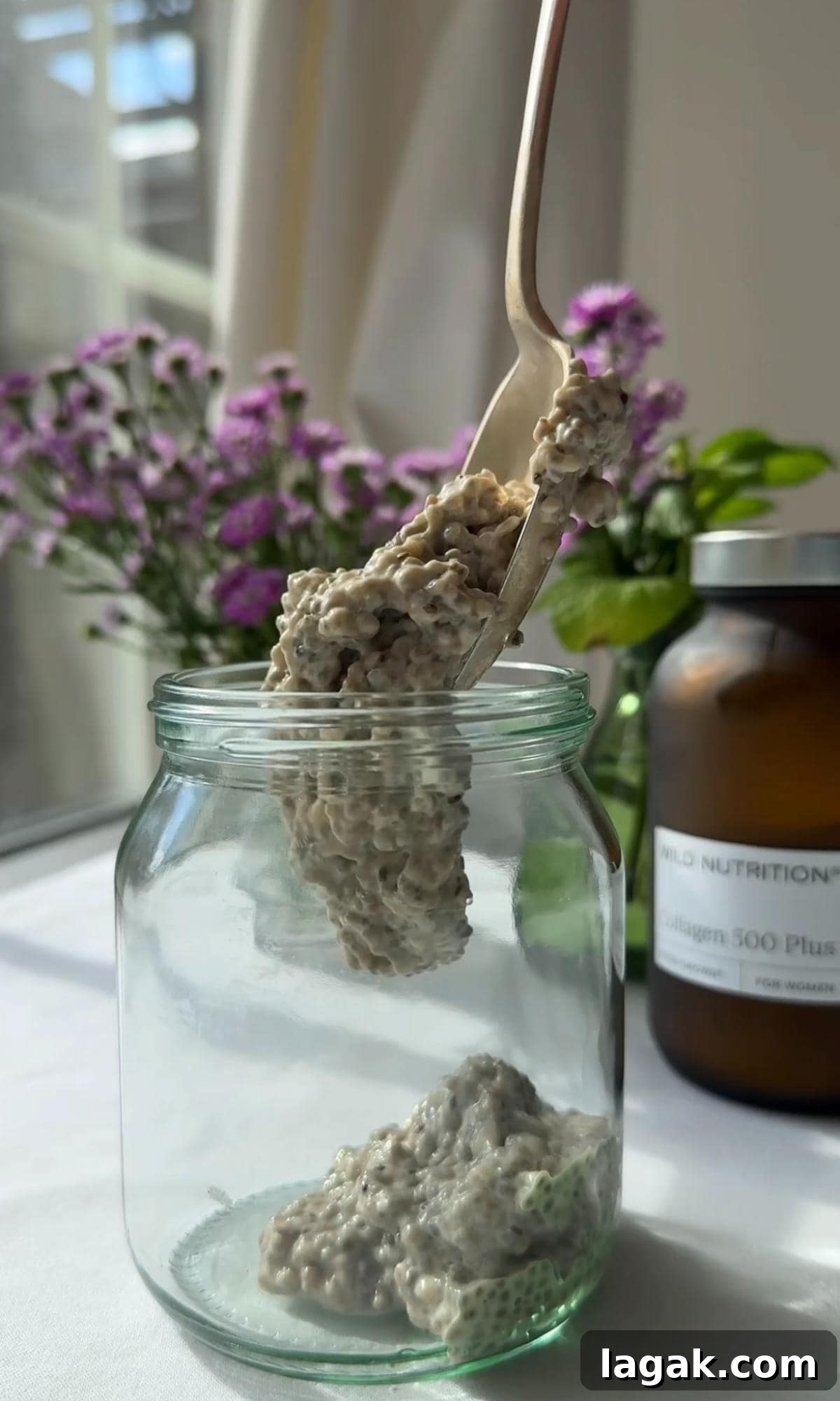 Tiramisu Chia Pudding with Creamy Yogurt — Quick Recipe 7 spooning the chia pudding into jars.