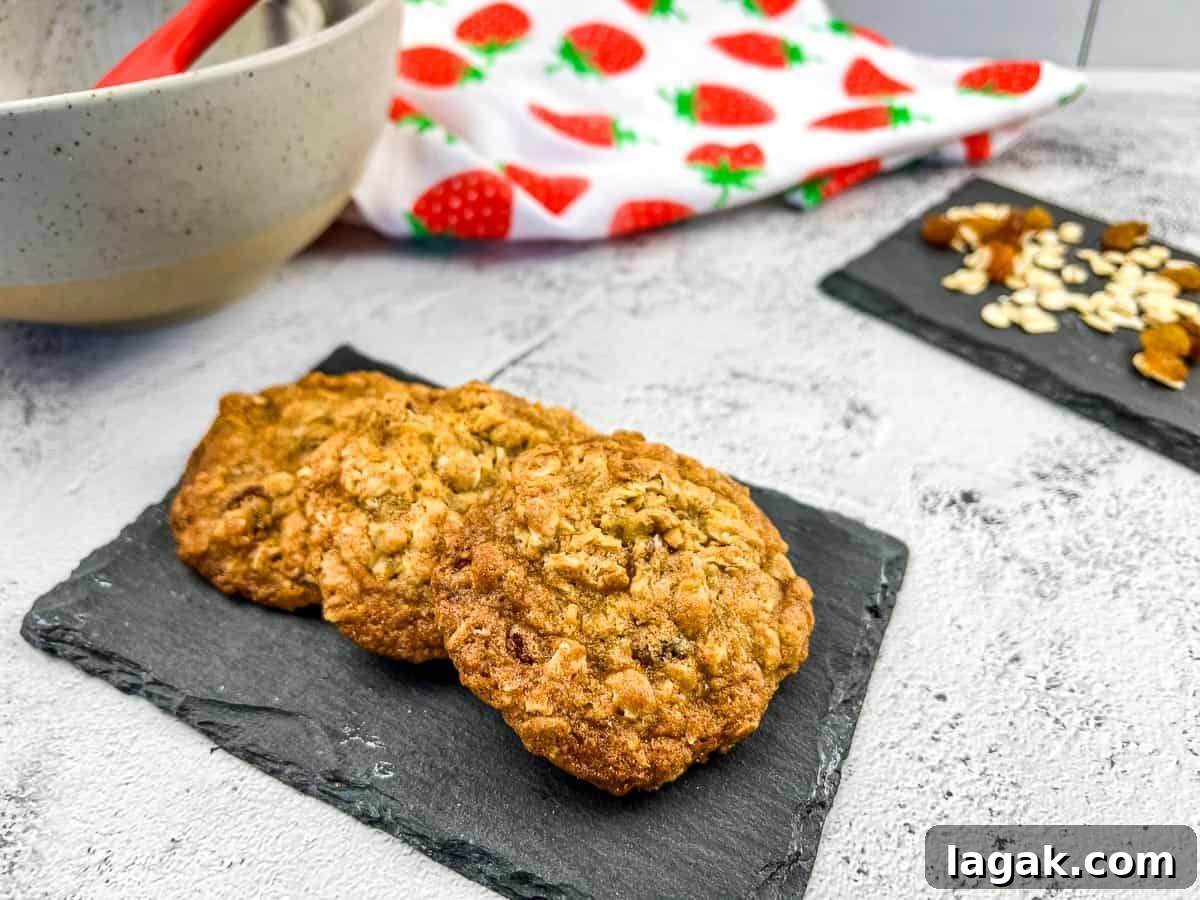 27 Cozy Fall Desserts That Taste Like Brown Sugar, Butter, and Memories 28 Oatmeal Raisin Cookies on a slate.