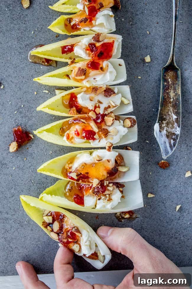 Smoky Almond Cream Cheese Endive Bites for Elegant Appetizers 3 Smokey Almond Cream Cheese Endive Bites from The Food Charlatan