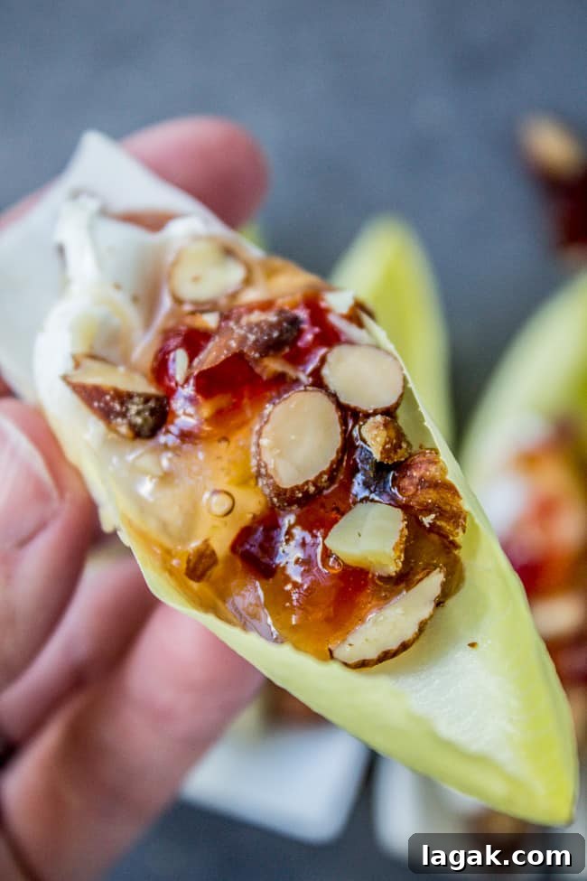 Smoky Almond Cream Cheese Endive Bites for Elegant Appetizers 5 Smokey Almond Cream Cheese Endive Bites from The Food Charlatan