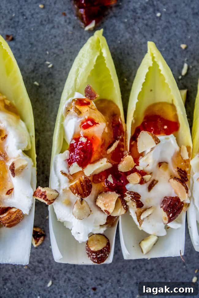 Smoky Almond Cream Cheese Endive Bites for Elegant Appetizers 7 Smokey Almond Cream Cheese Endive Bites from The Food Charlatan