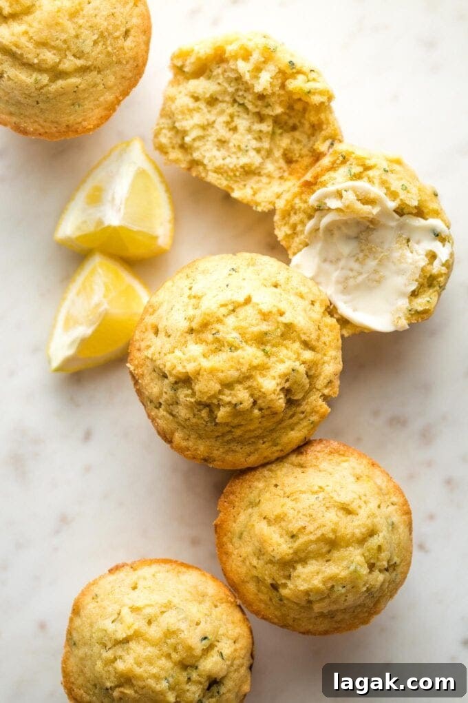 Lemon Olive Oil Zucchini Muffins with Light Citrus Glaze 2 Close-up overhead photo of lemon zucchini muffins.