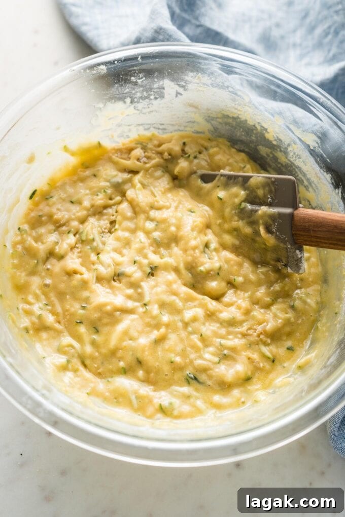 Lemon Olive Oil Zucchini Muffins with Light Citrus Glaze 6 Prep bowl with fully mixed muffin batter.