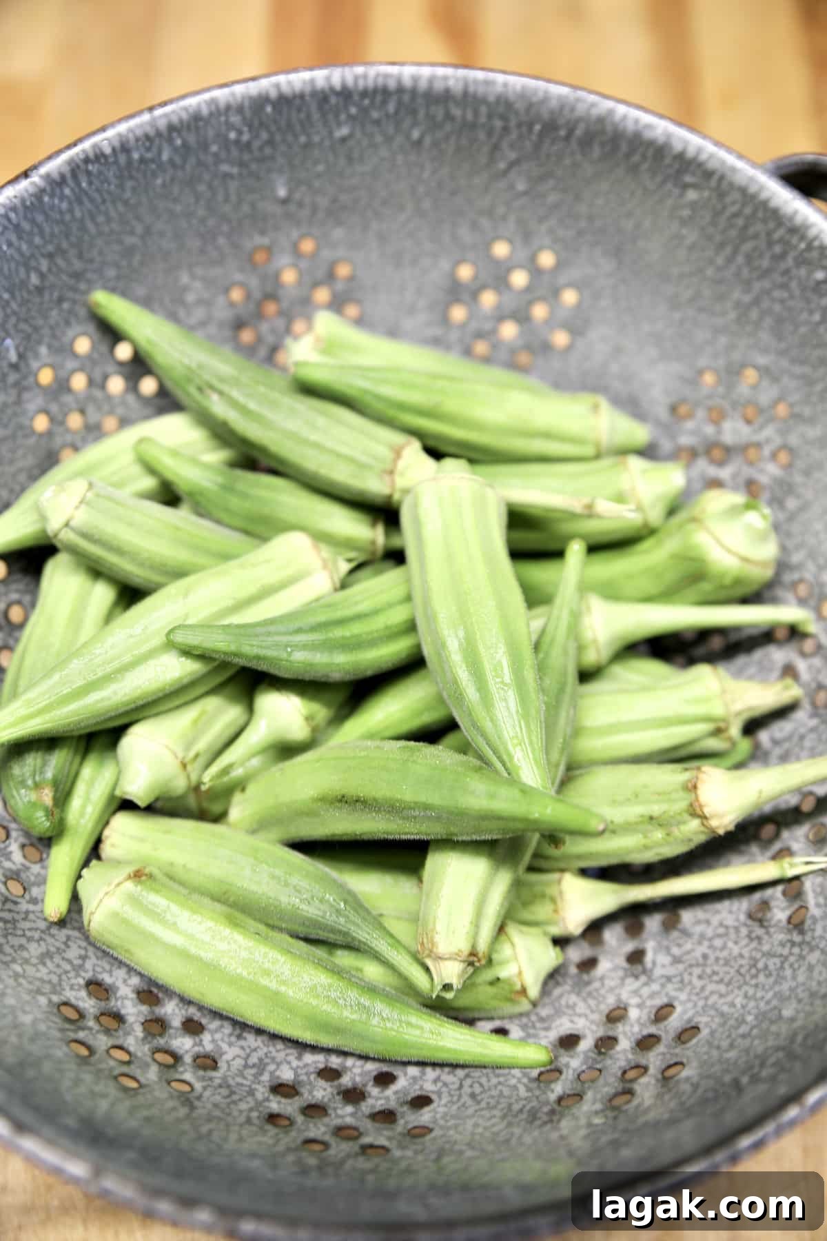 Okra grilling recipe. Grilled Okra in a colander.