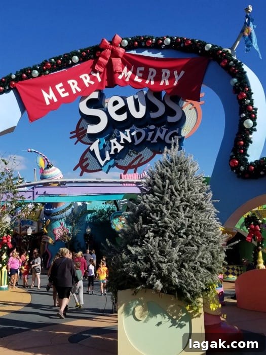 Universal Orlando Holiday Events and Seasonal Attractions 2026 5 Merry Merry Seuss Landing sign with holiday decorations