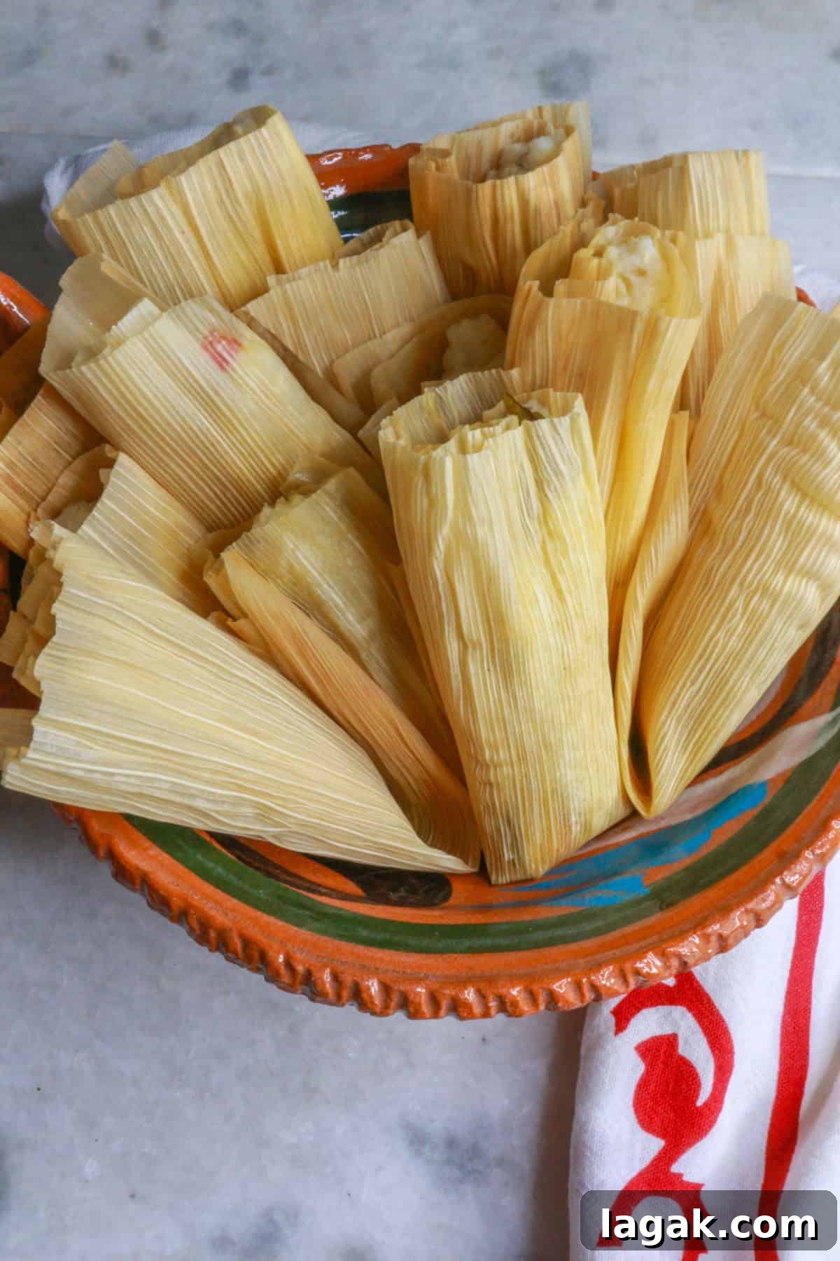 Refried Bean Tamales Recipe – Authentic Mexican Tamales 13 Cooked tamales in a bowl