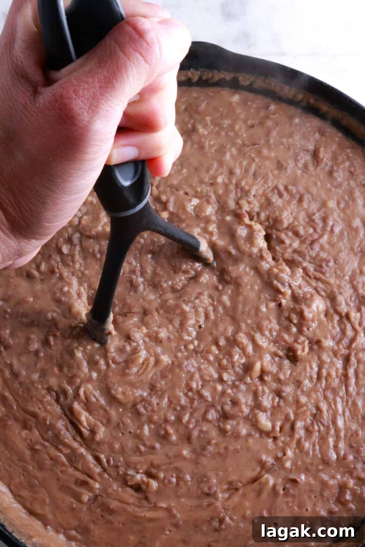 Refried Bean Tamales Recipe – Authentic Mexican Tamales 6 Mashing beans in skillet