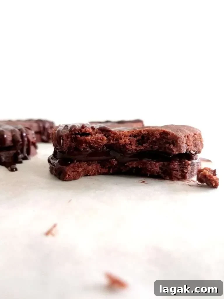 double chocolate sandwich cookies bitten head on view