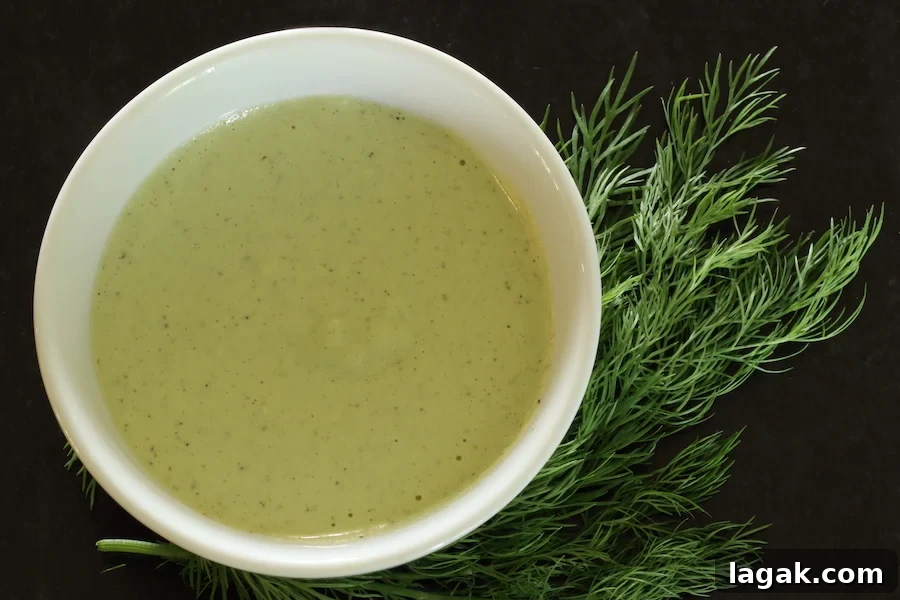 Creamy Dill Sauce & Dressing Recipe for Salmon, Chicken, and Salads 2 Cashew Dill dressing with sprigs of dill