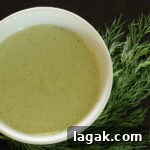 Cashew Dill dressing with sprigs of dill