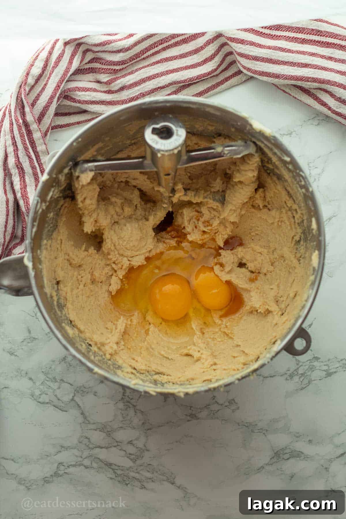 Extra-Soft Vanilla Pudding Chocolate Chip Cookies 5 Eggs in vanilla pudding cookie dough in mixing bowl.