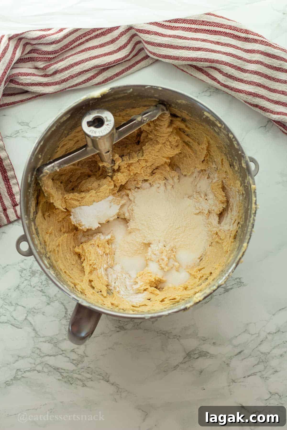 Extra-Soft Vanilla Pudding Chocolate Chip Cookies 6 Vanilla pudding mix in cookie dough in mixing bowl.