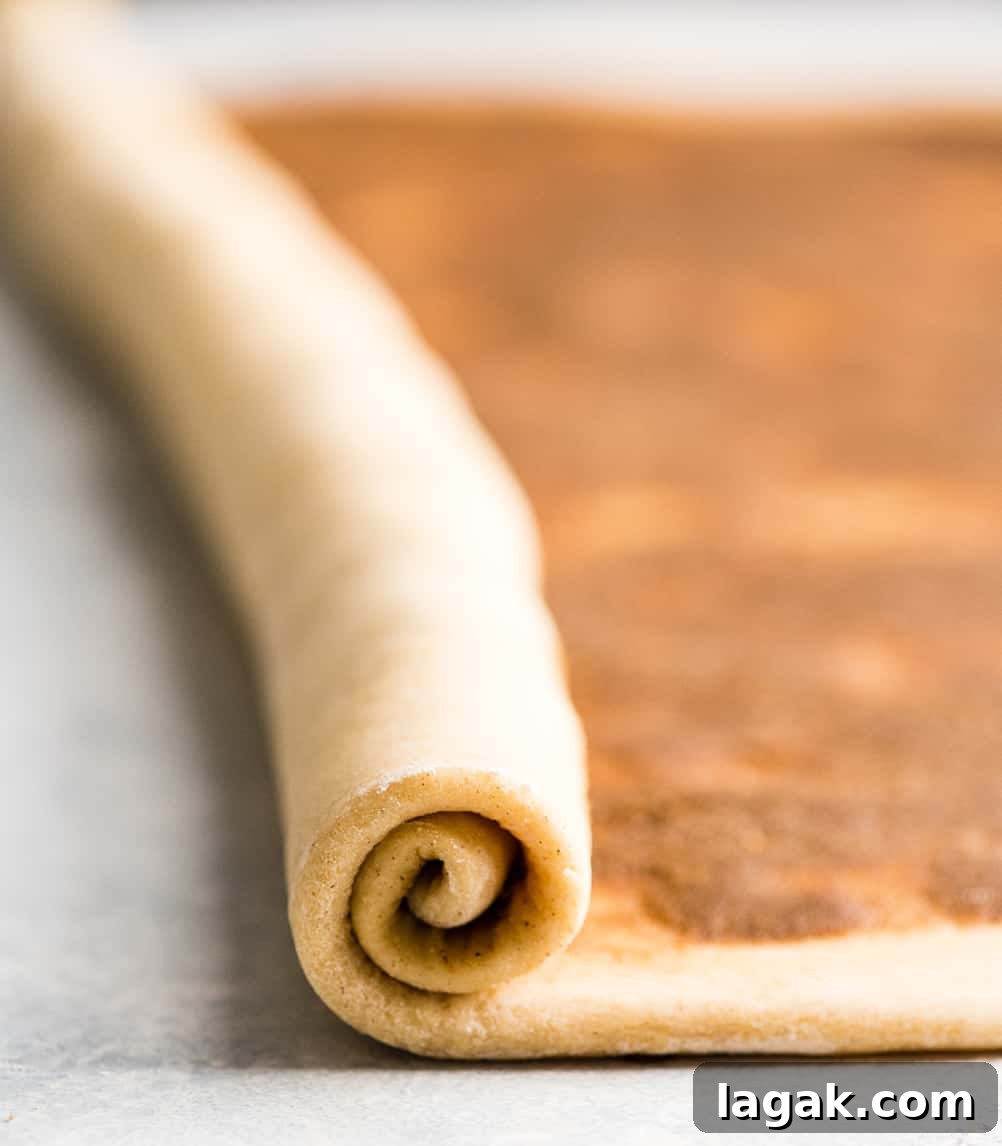Roll Dough front photo showing how to roll cinnamon roll dough