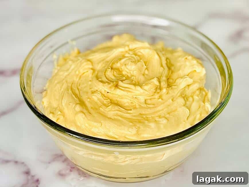 Decadent Chocolate Peanut Butter Cupcakes Recipe 9 Peanut butter icing in a bowl.