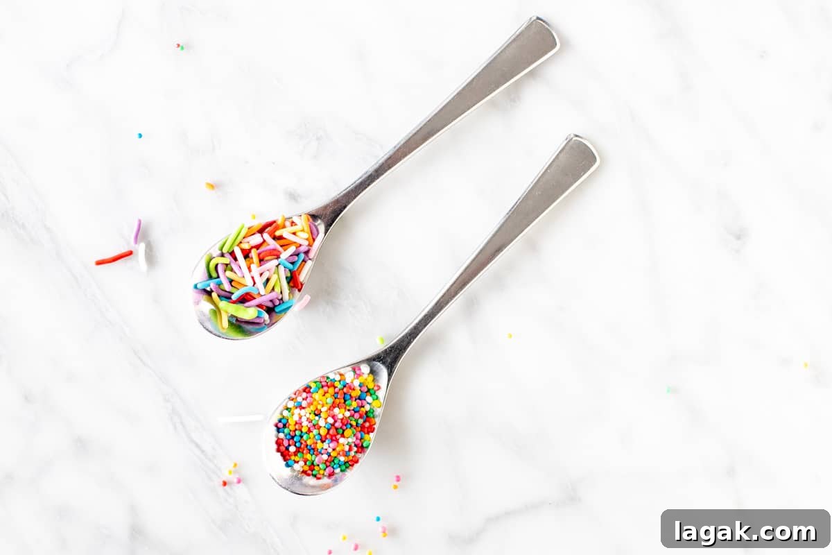 Funfetti Cake from Scratch Filled with Sprinkles 4 2 spoons of sprinkles