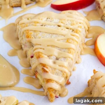 Top Apple and Pumpkin Desserts: 15 Fall Recipes to Try 14 An apple scone with frosting on top.