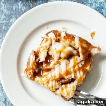 Top Apple and Pumpkin Desserts: 15 Fall Recipes to Try 4 An apple pie bar on a plate with a fork.