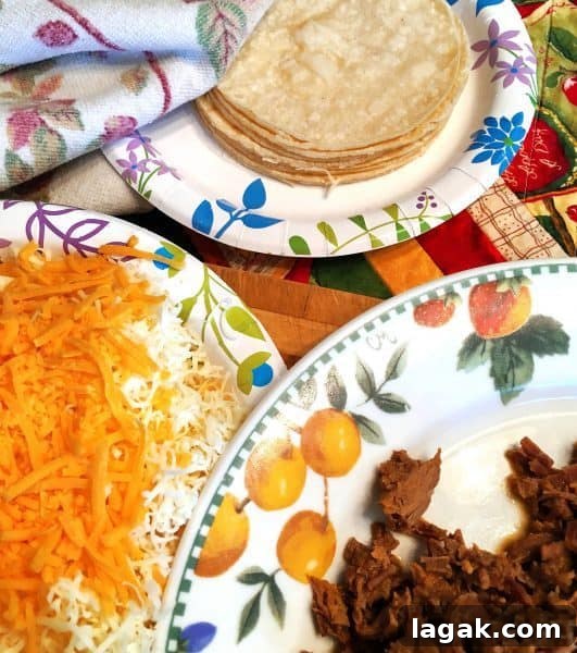 Crispy Homemade Taquitos Recipe 4 Taquito Prep with cheese and tortilla