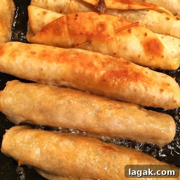 Crispy Homemade Taquitos Recipe 7 Taquito's frying