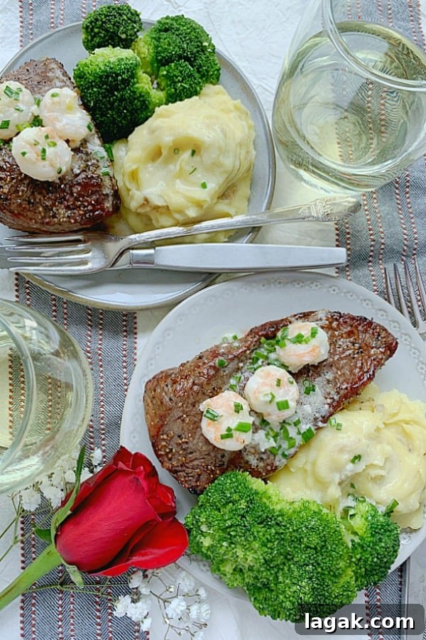 Air Fryer Steak with Creamy Garlic Shrimp Sauce 2 air fryer steak with shrimp cream sauce on plates with mashed potatoes and broccoli