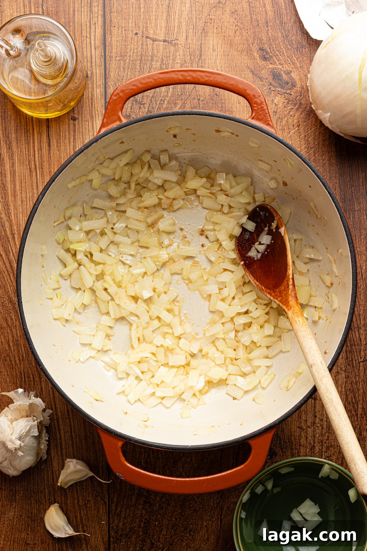 30-Minute High-Protein Turkey Chili Recipe 4 A large pot filled with sauteed onions and garlic