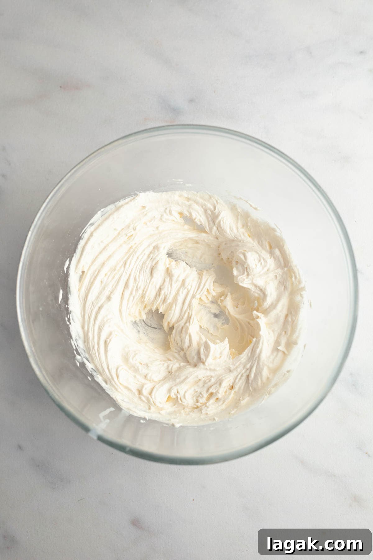 Moist Chocolate Cupcakes with Cream Cheese Frosting Recipe 8 Whipped cream in a bowl.