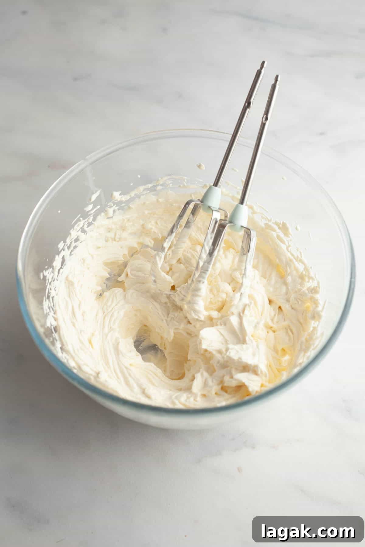 Moist Chocolate Cupcakes with Cream Cheese Frosting Recipe 9 Cream cheese frosting in a bowl.