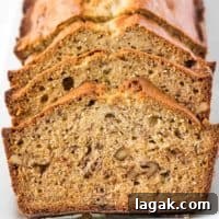 Ultimate Moist Banana Bread Recipe You’ll Make Again and Again 2 Several slices of banana bread on a platter.