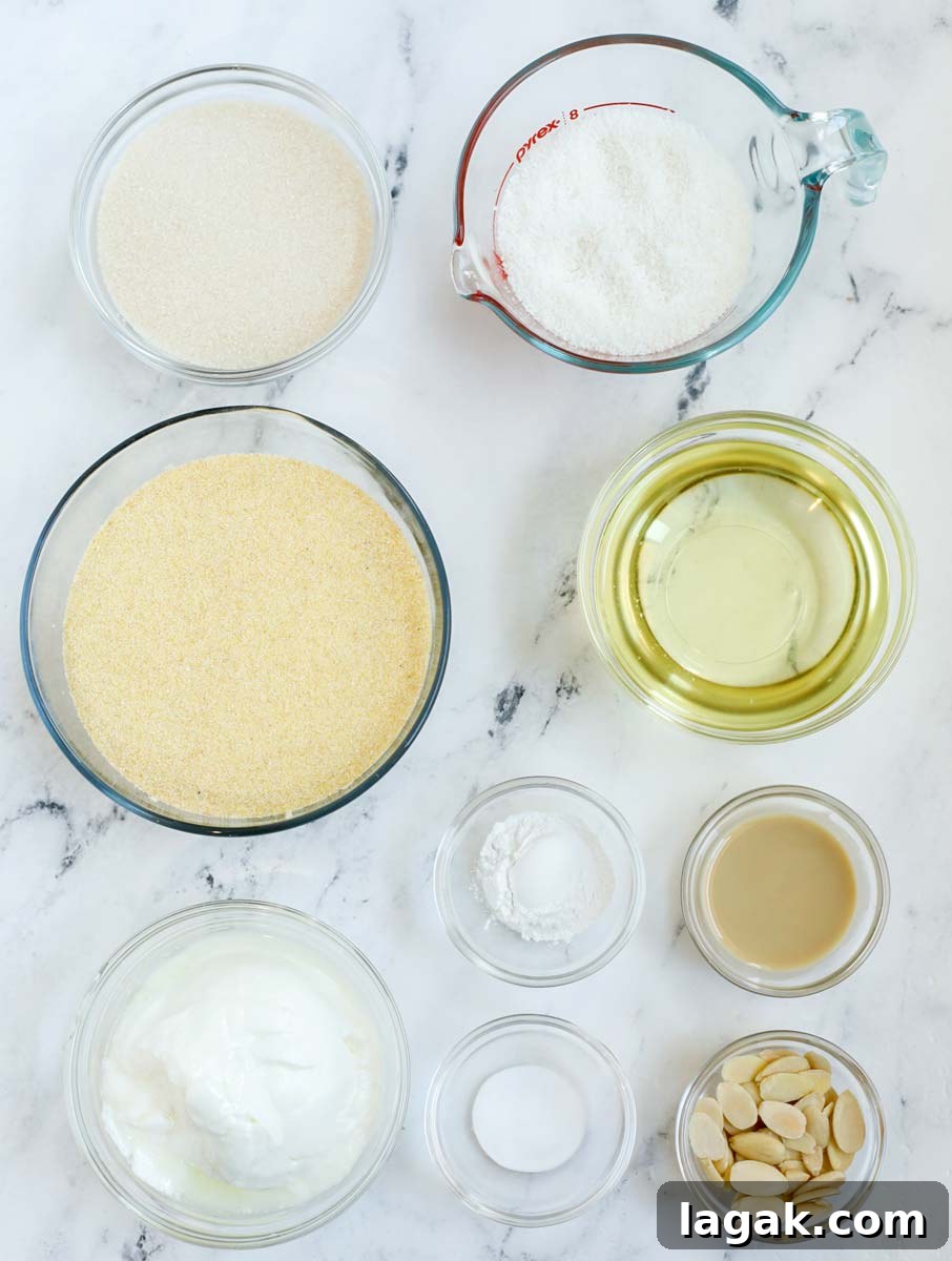 Coconut Basbousa Recipe: Moist Semolina Cake with Syrup 3 Basbousa ingredients laid out