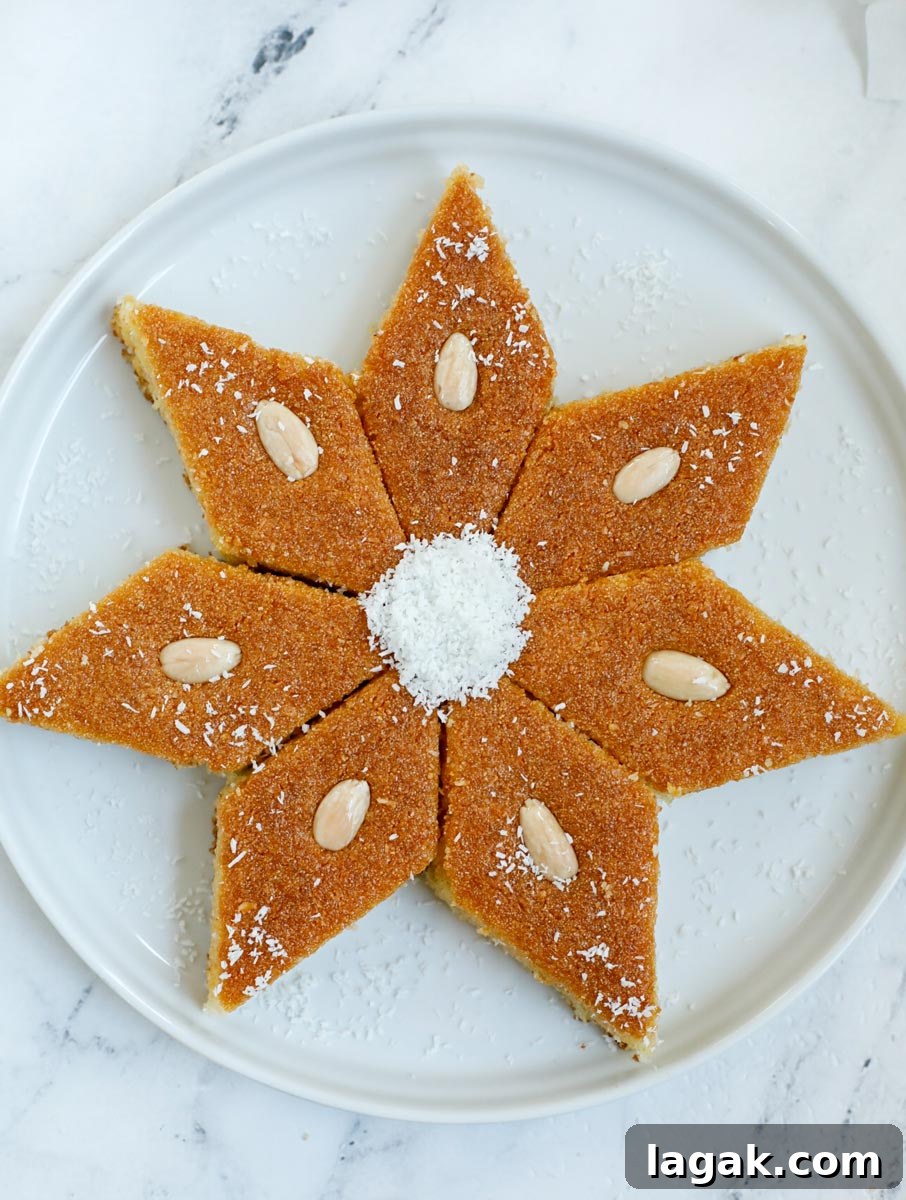 Coconut Basbousa Recipe: Moist Semolina Cake with Syrup 8 Seven pieces of Coconut Basbousa placed in a star shape.