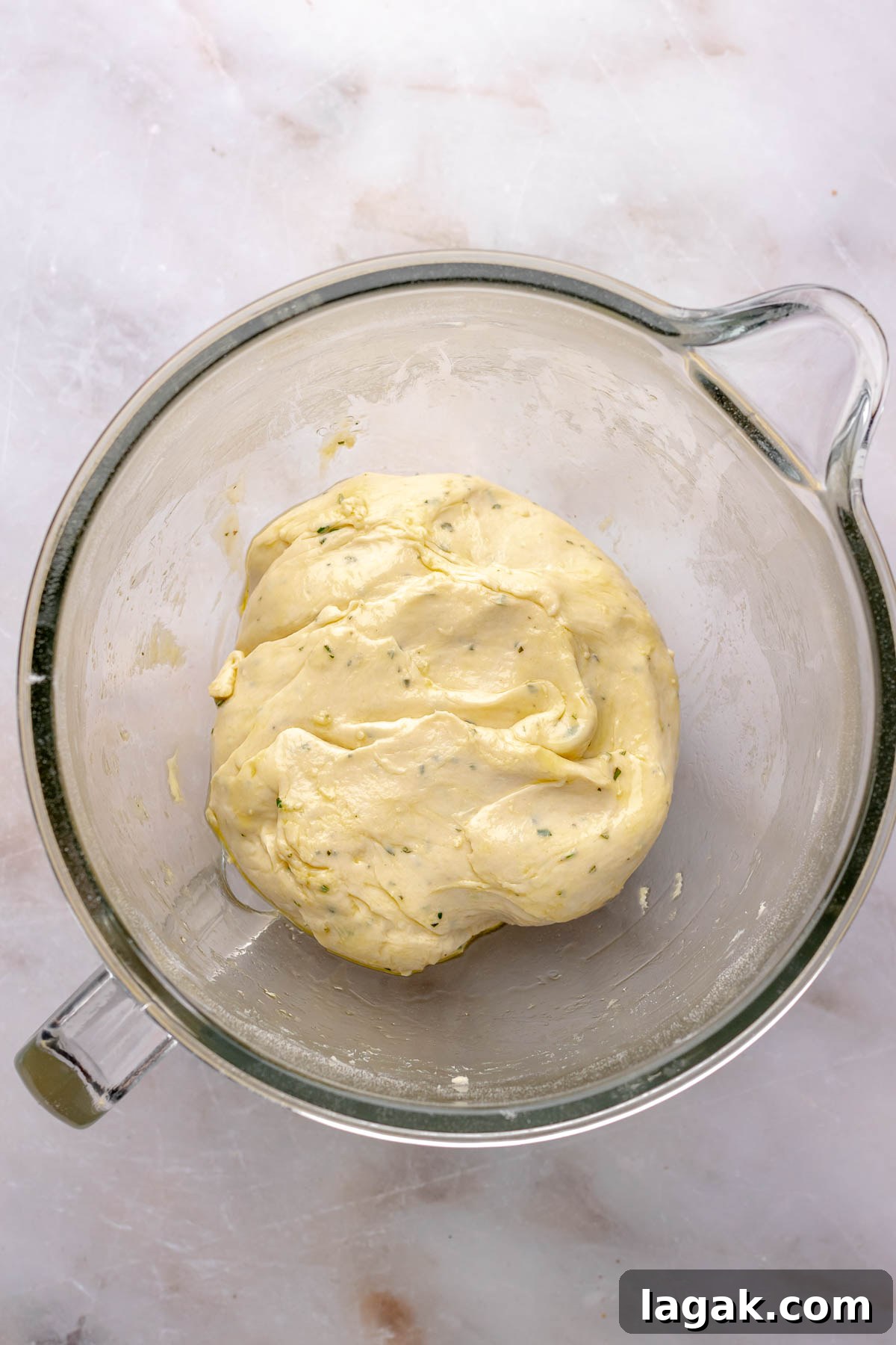 Savory Breakfast Rolls with Creamy Hollandaise Sauce 8 Finished cinnamon roll dough in a bowl.