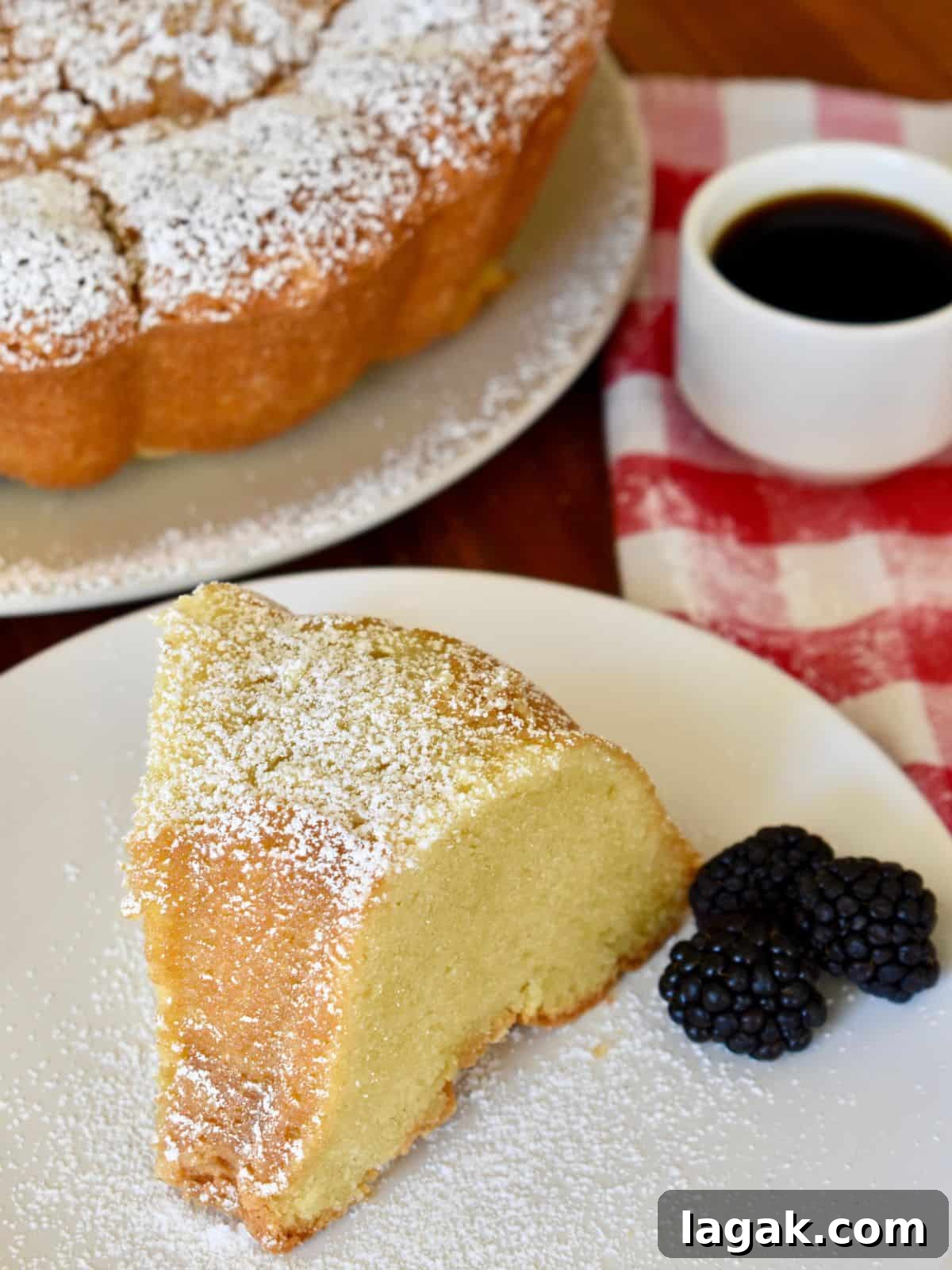 Mascarpone Pound Cake Recipe: Moist Italian Cream Cake with Mascarpone 6 Mascarpone pound cake on a white plate.