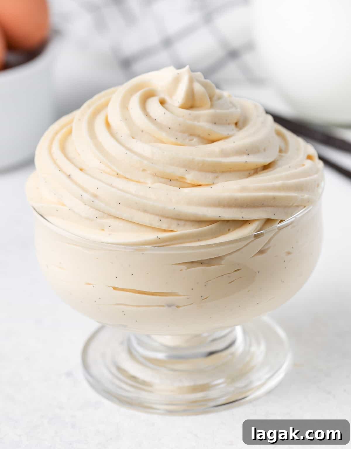 Bavarian Cream Recipe: Silky Crème Bavaroise Made at Home 7 Cream piped inside a glass cup.