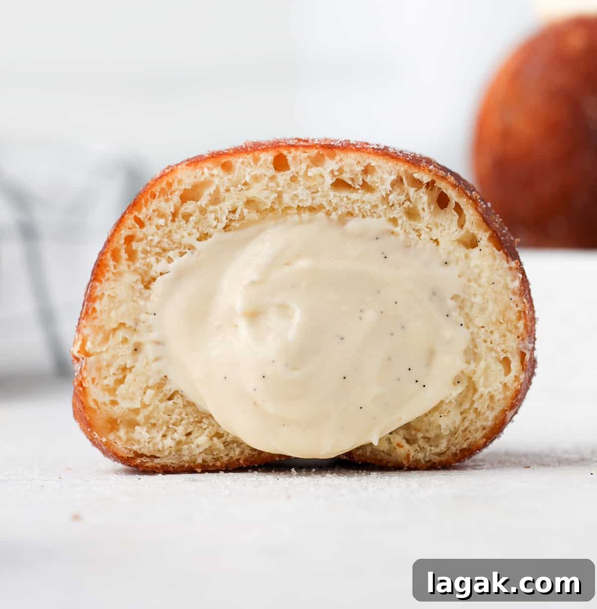 Bavarian Cream Recipe: Silky Crème Bavaroise Made at Home 8 Donut filled with cream sliced in half.
