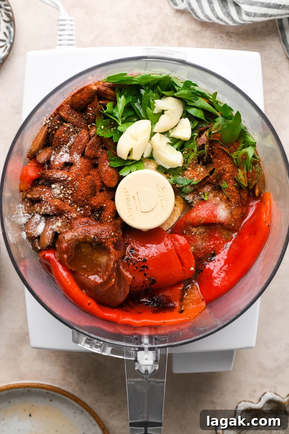 10-Minute Rustic Romesco Sauce (Dairy-Free) 6 How to make Dairy Free Romesco Sauce: All ingredients in the container of a food processor before pulsing to combine.