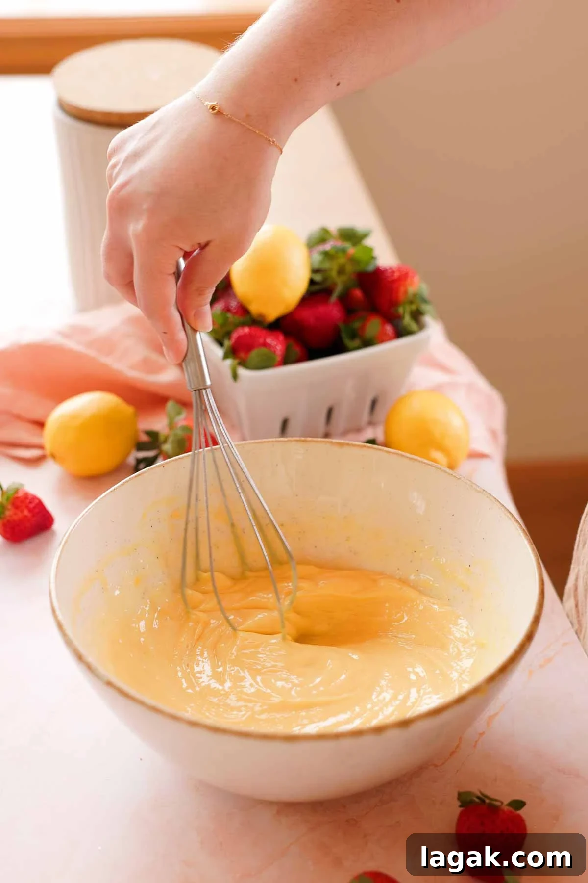 Strawberry Lemon Bars Recipe with Zesty Shortbread Crust 11 whisking lemon bar filling in a large bowl