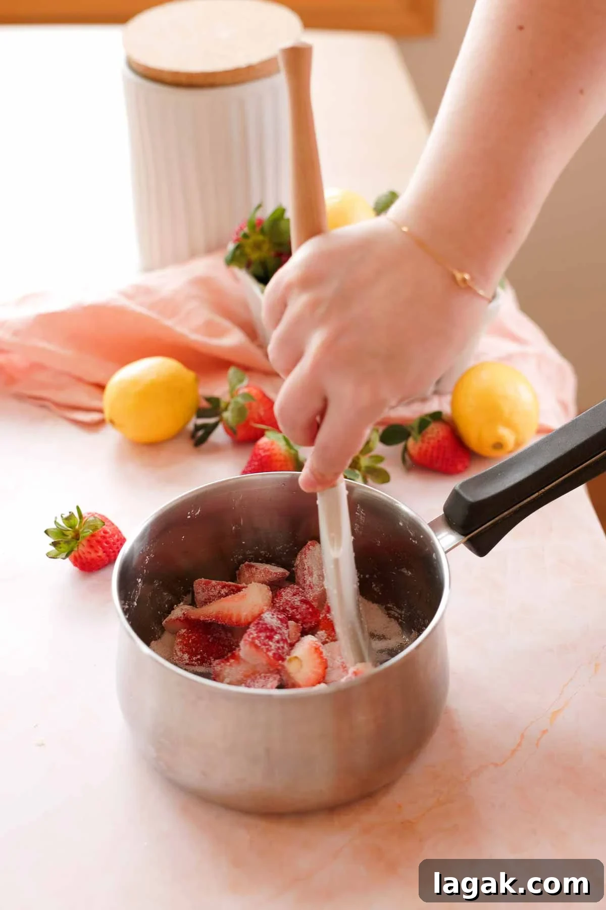 Strawberry Lemon Bars Recipe with Zesty Shortbread Crust 8 mixing strawberries, sugar, and cornstarch in a saucepan
