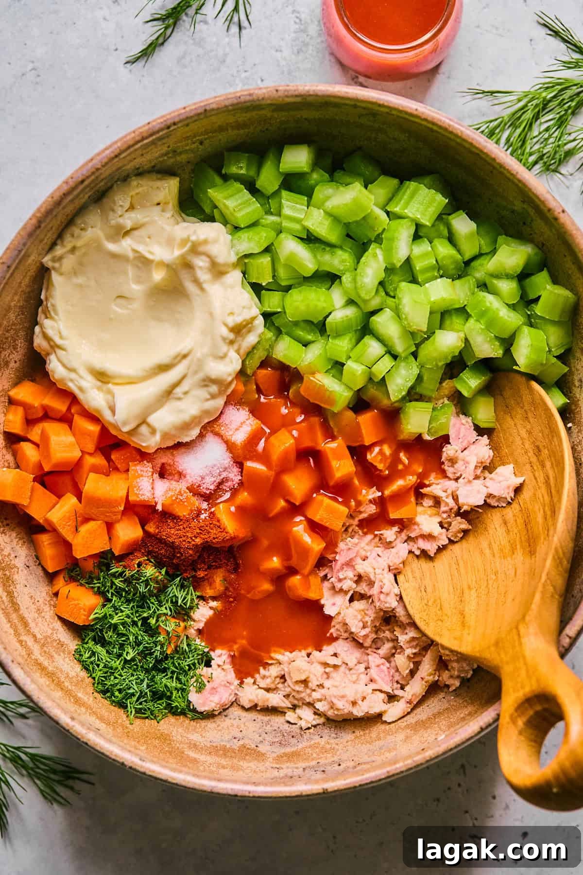 High-Protein Buffalo Tuna Salad Recipe for Meal Prep 4 ingredients in a bowl before they've been combined
