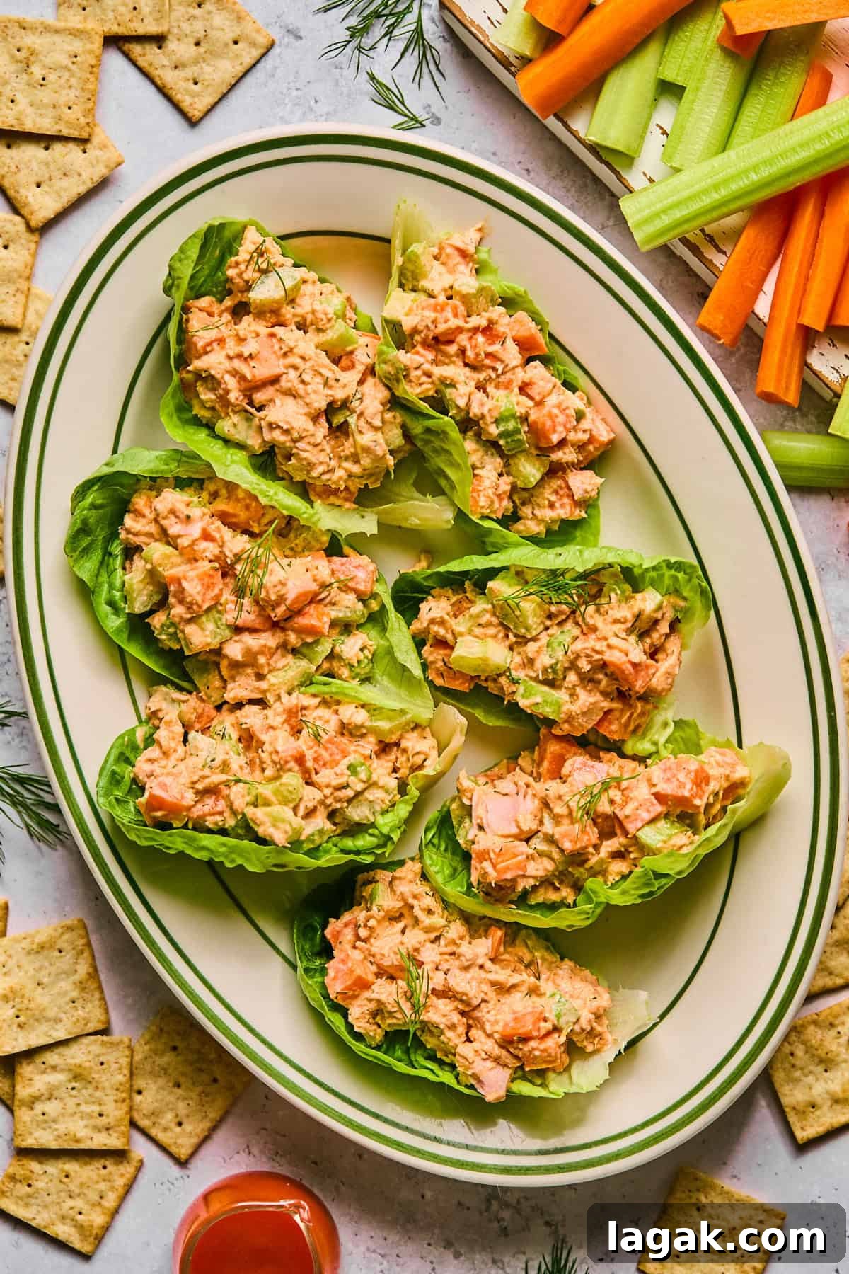 High-Protein Buffalo Tuna Salad Recipe for Meal Prep 8 tuna salad stuffed into lettuce cups on a large platter