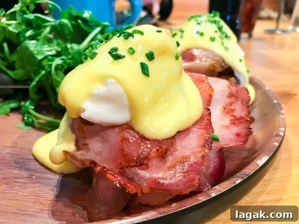 Top Portland Lunch Spots for Spring & Summer 2022 13 eggs benedict from the la luna menu served with Irish bacon