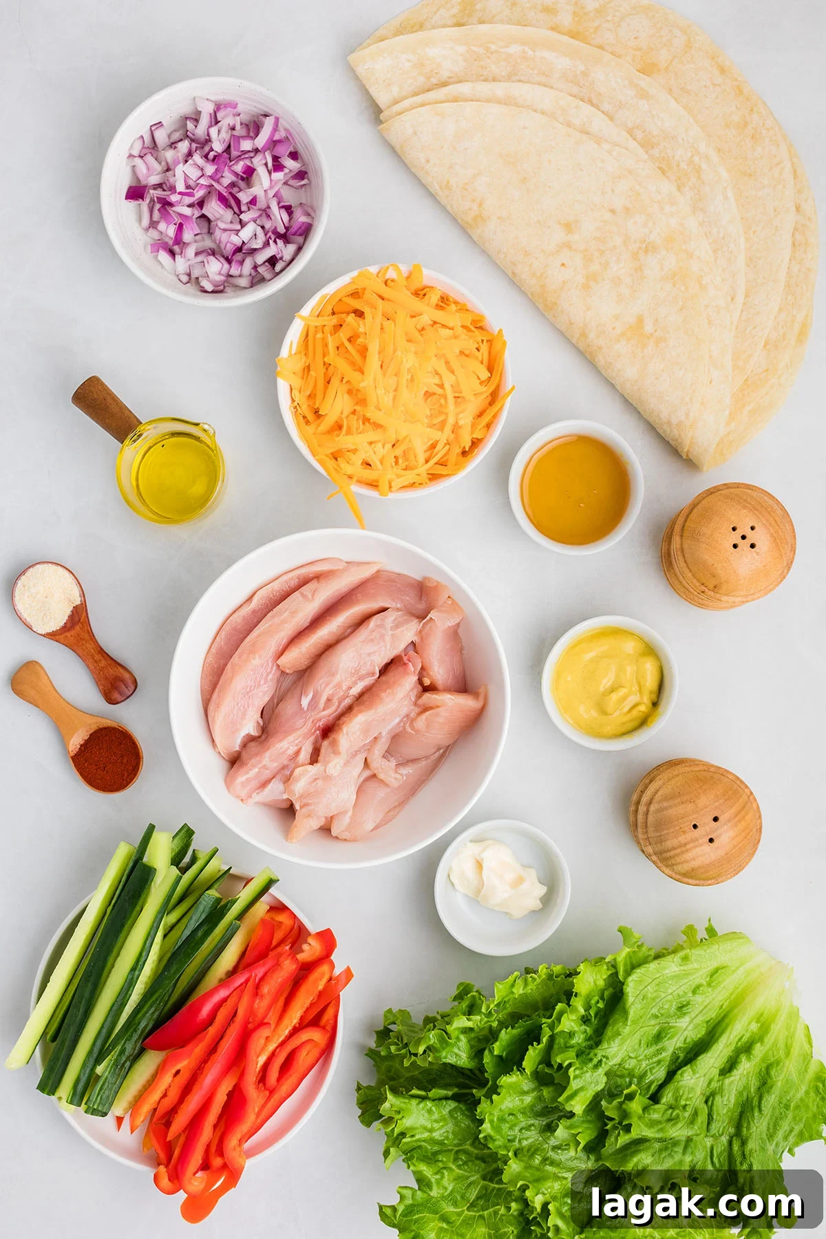 Honey Mustard Chicken Wrap Recipe: Quick Flavorful Lunch Idea 3 Ingredients to make Honey Mustard Chicken Wraps set out on the counter.
