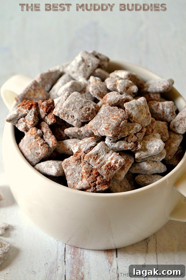 No-Bake Peanut Butter Balls Recipe for Quick Homemade Treats 7 white bowl of muddy buddies on white wood