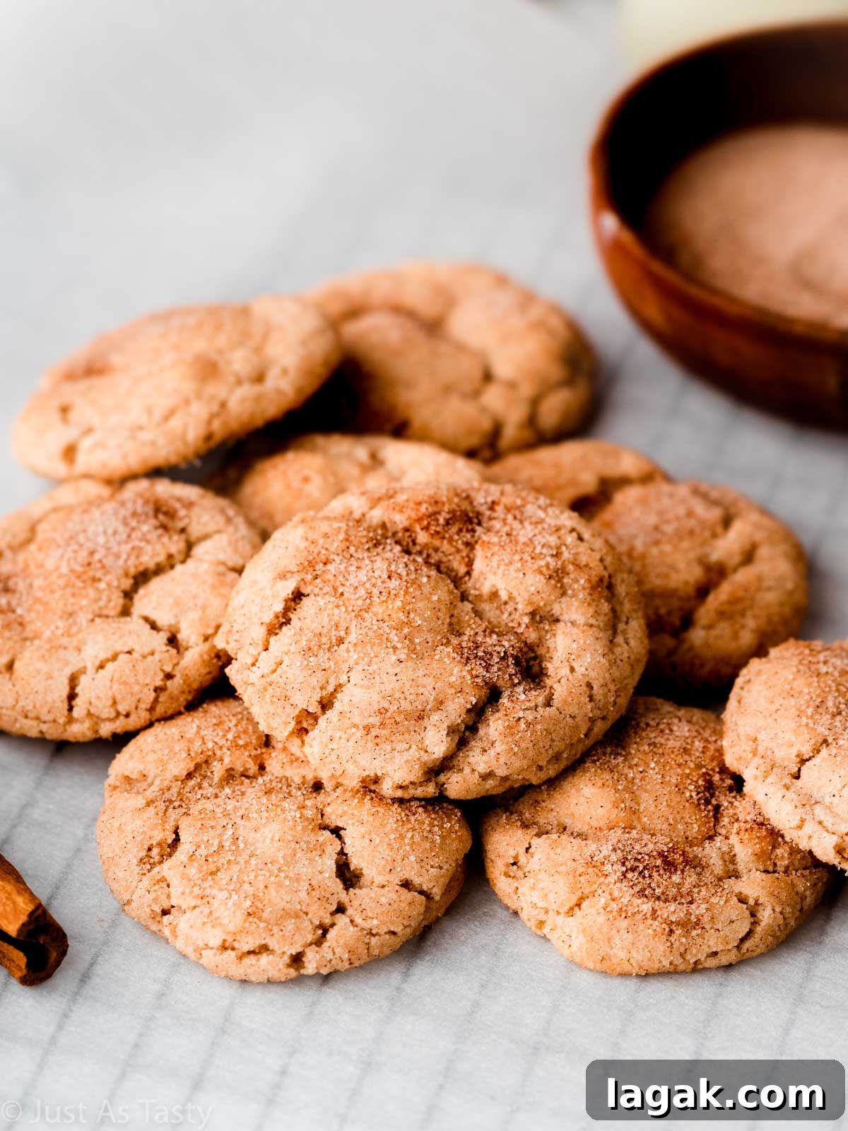 Gluten-Free Snickerdoodle Cookies: Soft Cinnamon Recipe 9 Pile of gluten free snickerdoodles on parchment.