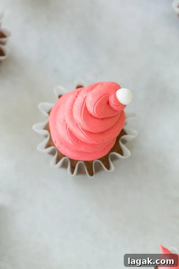 Santa Hat Gingerbread Cupcakes Recipe for Holiday Parties 4 Gingerbread cupcake with red frosting.