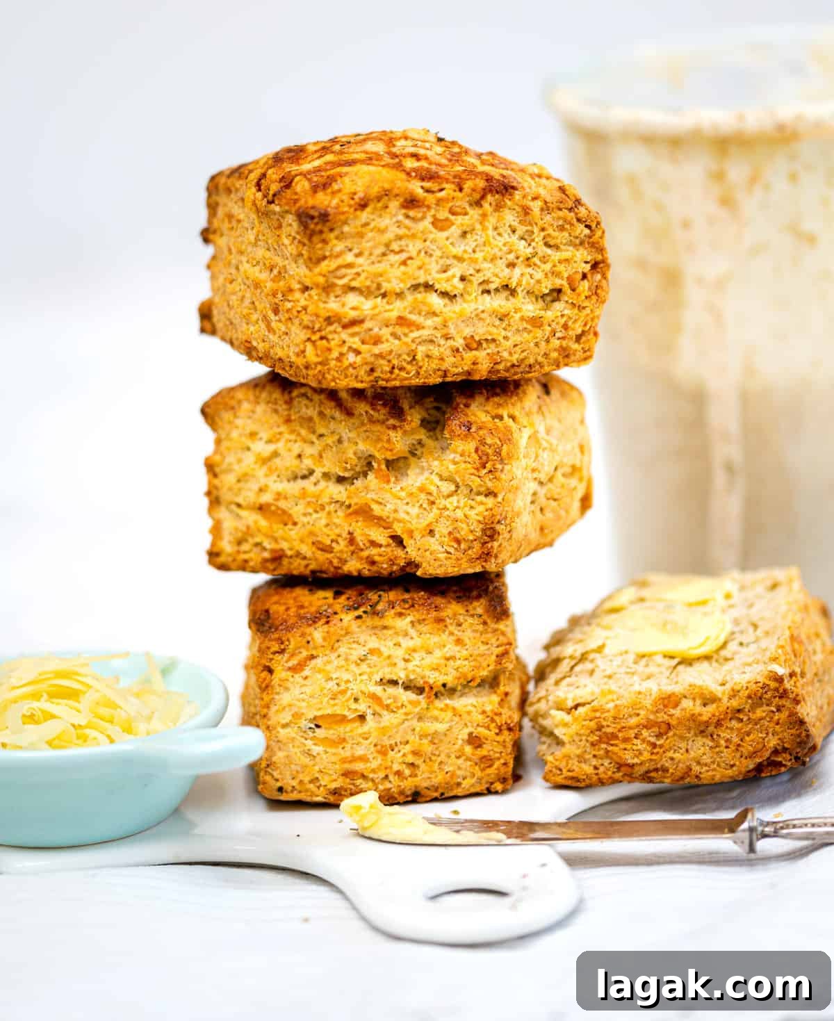 Sourdough Cheese scones stacked on a ceramic board